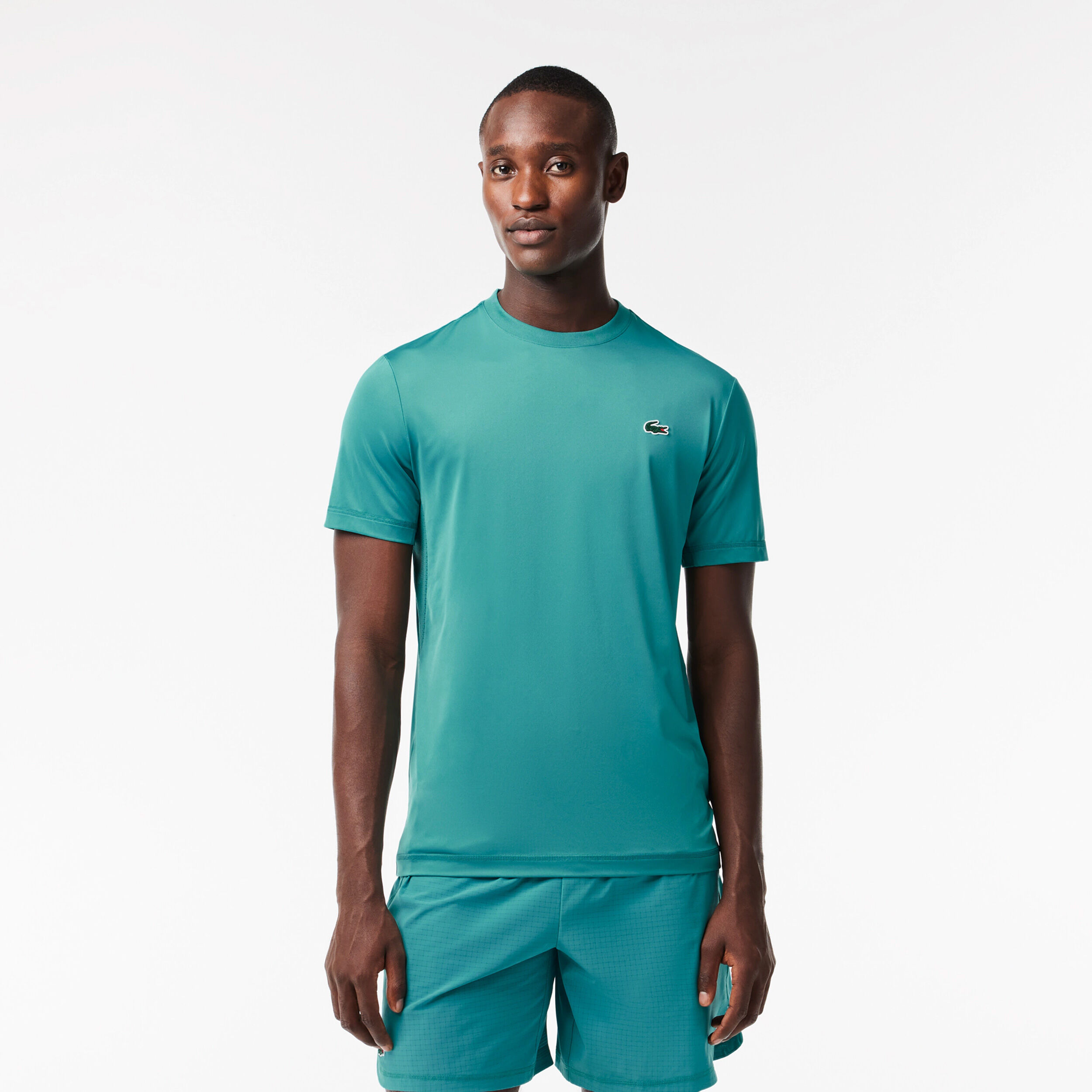 Lacoste dry fit best sale shirt